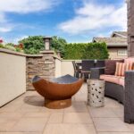 Outdoor livingspace with furniture and firepit